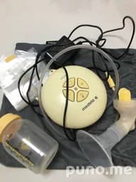 Молокоотсос Medela Swing